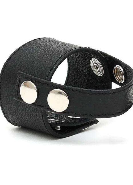 Penis Strap Adjustable black textured strap with a wraparound band, two silver snaps and multiple adjustment holes