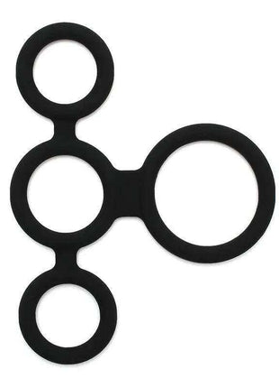 Quatro Cock Ring with four connected black silicone rings in varied sizes, including three smaller rings and one large ring.