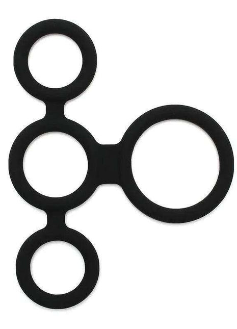 Quatro Cock Ring with four connected black silicone rings in varied sizes, including three smaller rings and one large ring.