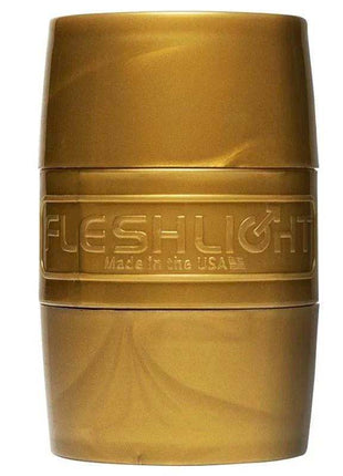 Quickshot Stamina Training Unit, a compact gold-toned sleeve with a smooth finish and embossed Fleshlight branding.