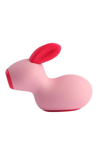 Rabbit Clitoris Sucker in smooth pale pink silicone with a bright pink rabbit ear and rounded body