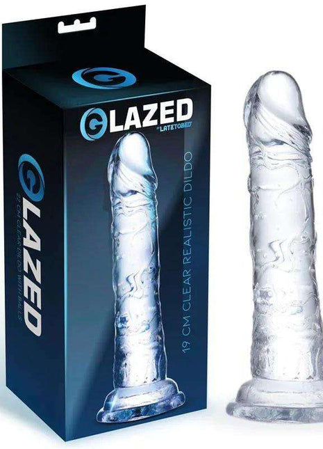 Realistic Dildo in clear crystal-like material, with a lifelike veined shaft, curved tip and wide flared base