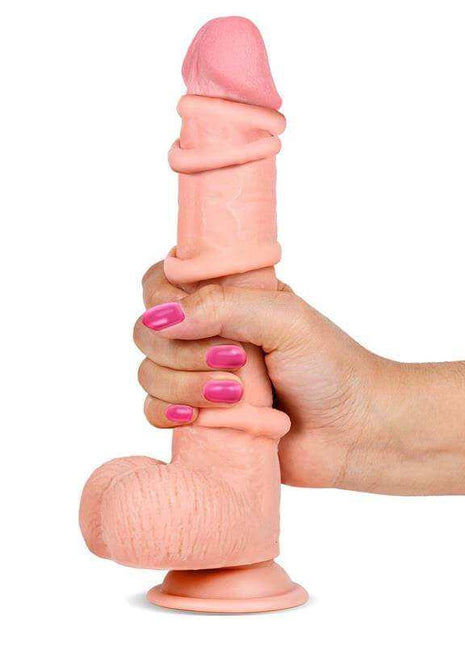 Realistic Dildo in pale pink TPE with a textured shaft, rounded tip, molded testicles and suction cup base