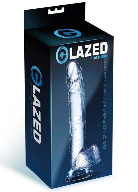Realistic Dildo with Testicles Crystal Material retail box featuring Glazed branding and a clear dildo illustration