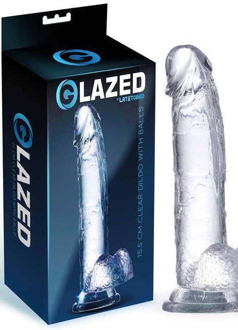 Realistic Dildo with Testicles Crystal Material, transparent flexible design with a veined shaft, rounded tip and suction base.