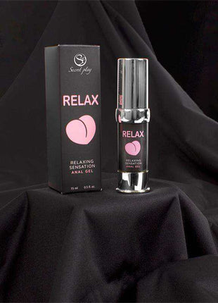 Relax! Anal Gel in a black box and silver pump bottle, featuring pink lettering and a heart-shaped graphic