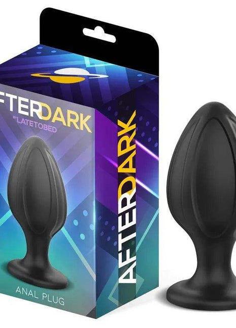 Rifter Butt Plug in black silicone with a smooth tapered body, rounded tip and wide flared base beside its Afterdark box