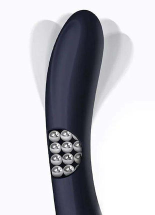 Royalspace Vibe with Rotating Tongues in dark navy, with a smooth curved body and clustered metallic rotating tips