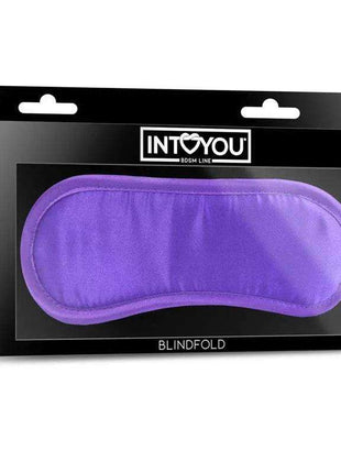 Satin Blindfold Purple with a smooth, padded violet fabric front and curved stitched edges, displayed in black retail packaging