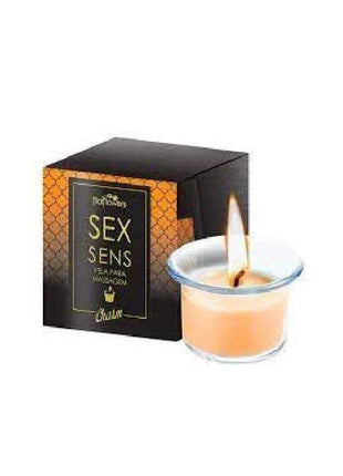 Luxury scented massage candle champagne with warm melting wax for skin nourishment and relaxation