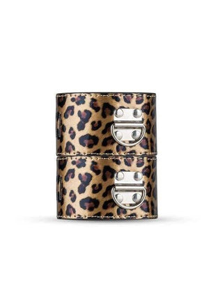 Secret Pleasure Chest with a tan and black leopard-print covering, stacked box design and silver metal clasps