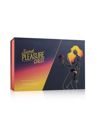 Secret Pleasure Chest gift box in navy and sunset-gradient colors, featuring Wicked Wildcat artwork and gold lettering.
