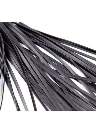 Shinny Handle Flogger with numerous thin black strips, showing a smooth, flexible tail construction