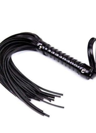 Shinny Handle Flogger with a glossy black ribbed handle, wrist loop and multiple long black tails