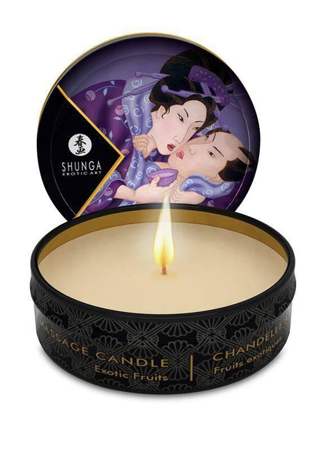 Shunga Mini Candle in a black round tin with gold lettering, cream wax, a lit wick and illustrated lid