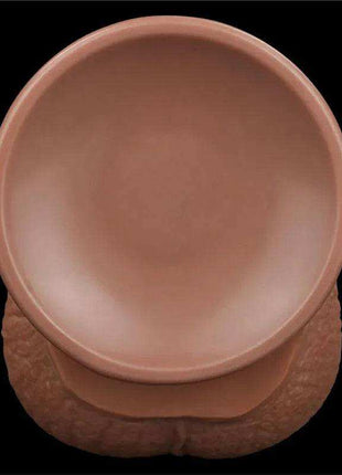 Sliding Skin Dual Layer dildo with a realistic tan TPE exterior, textured shaft and rounded opening