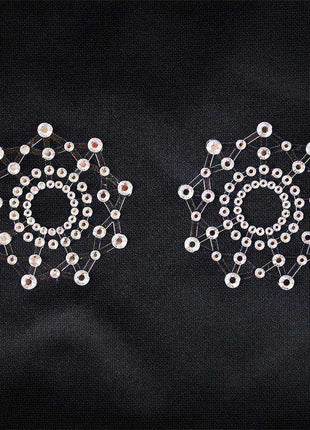 Elegant white snowflake nipple covers for discreet fashion