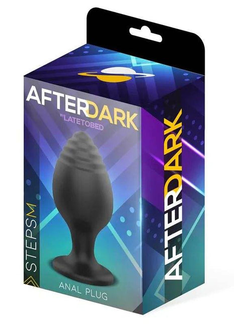 Steps Butt Plug shown in purple and blue Afterdark packaging, with a black textured silicone plug visible through the box window.