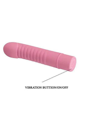Stimulator Mick Silicone Pink, a pink silicone cylindrical vibrator with a rounded tip, ribbed grip and end button