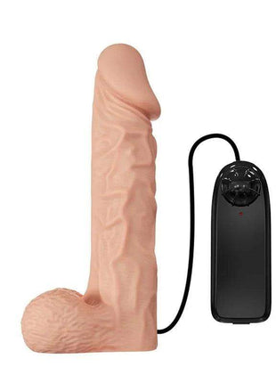 Strap-on with Dildo featuring a realistic flesh-toned silicone shaft, textured base, and attached black vibration controller