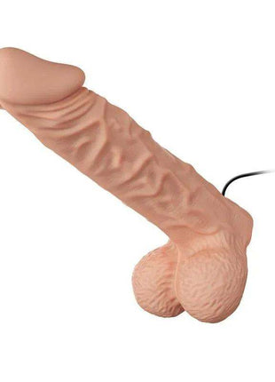 Strap-on with Dildo in peach-toned silicone, with a pronounced textured shaft, rounded tip and sculpted base