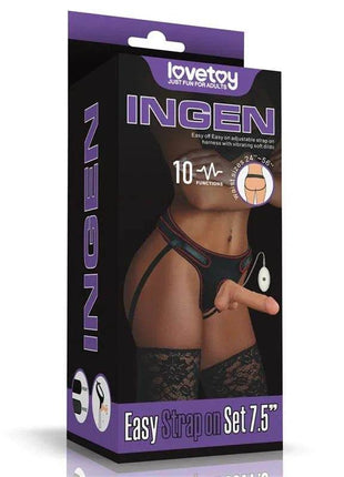 Strap-on with Dildo with Vibration set in black harness with adjustable straps and a flesh-toned dildo, shown on packaging