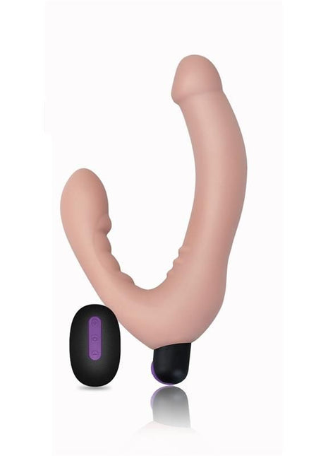 Strapless Doble Dildo in flesh-toned silicone, with two curved shafts and a separate black-and-purple remote