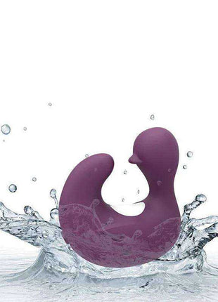 Swamson Stimulator Duckling Thimble in violet silicone, with a curved duckling-shaped body and rounded head