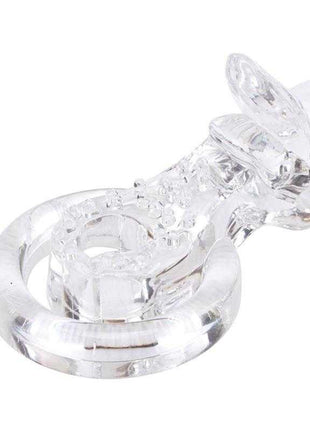 Tongue-Clear Vibrating Ring in transparent clear material, with a thick circular band and textured raised details.