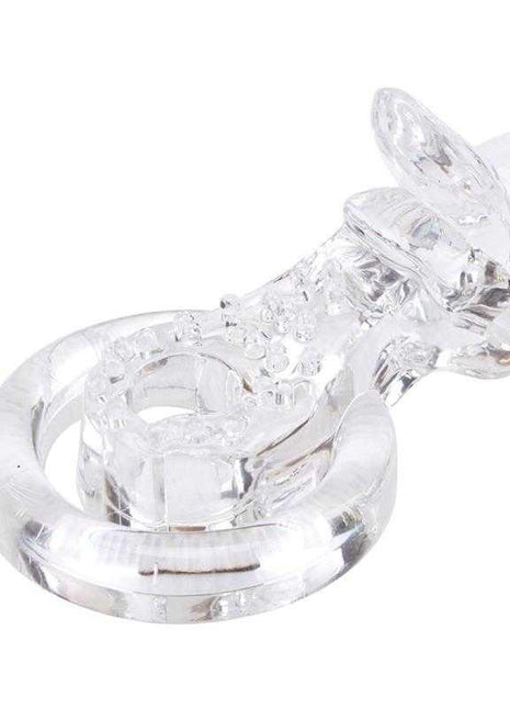 Tongue-Clear Vibrating Ring in transparent clear material, with a thick circular band and textured raised details.