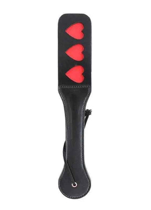 Vegan Leather Paddle in black with three bright red heart accents, stitched edges and a wrist strap