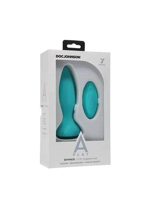 Vibrating and Rotating Butt Plug in turquoise silicone, shown with its matching oval remote inside white retail packaging