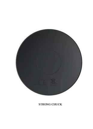 Vibrating Butt Plug with a flat, round black charging base featuring a subtle circular control and embossed symbols