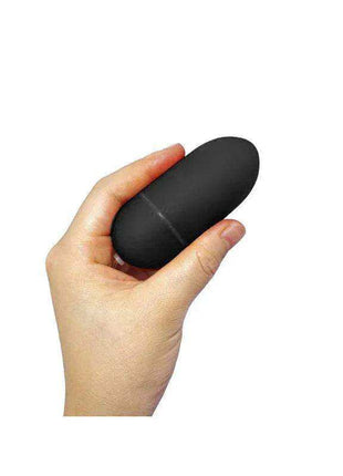 Black vibrating egg with wireless remote control for intimate pleasure