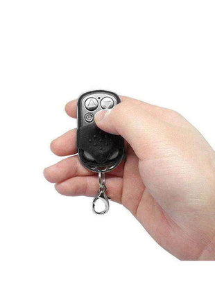 Vibrating Egg with Remote Control featuring a compact black remote with silver buttons and a metal keyring loop