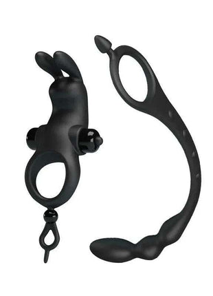 Vibrating Ring with Butt Plug in black silicone, featuring an adjustable loop, curved plug, and textured details
