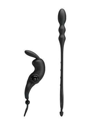 Vibrating Ring with Butt Plug set in black silicone, featuring a curved vibrating ring and a long, ridged plug