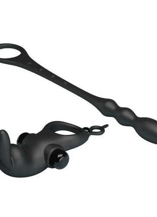 Vibrating Ring with Butt Plug in black silicone, featuring a wearable ring toy and a separate textured accessory.