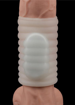 Vibrating TPE Penis Sleeve in translucent ivory with a soft ribbed texture and raised central stimulation panel