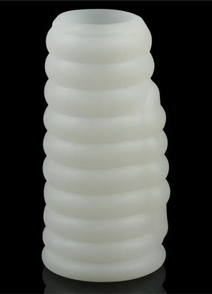 Vibrating TPE Penis Sleeve in translucent white, with a soft, elastic body and raised horizontal ridges.