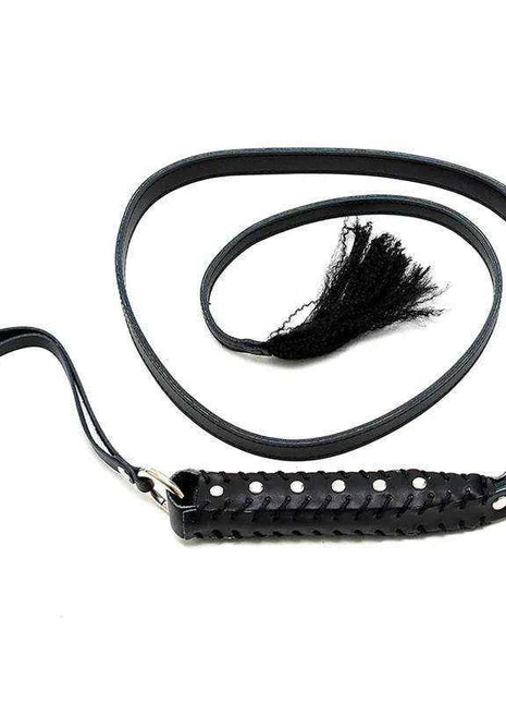 Whip Leather 130 cm in black leather with a braided handle, wrist loop, long coiled strap and tassel tip