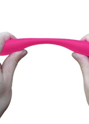 Yedda Vibrator Bendable Pink with a smooth, bright pink flexible body, shown bending between two hands