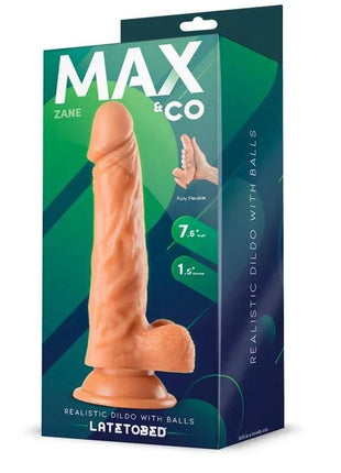 Zane Realistic Dildo in peach-toned realistic silicone, with ridged detailing, a flared base and integrated testicles, shown in green packaging.