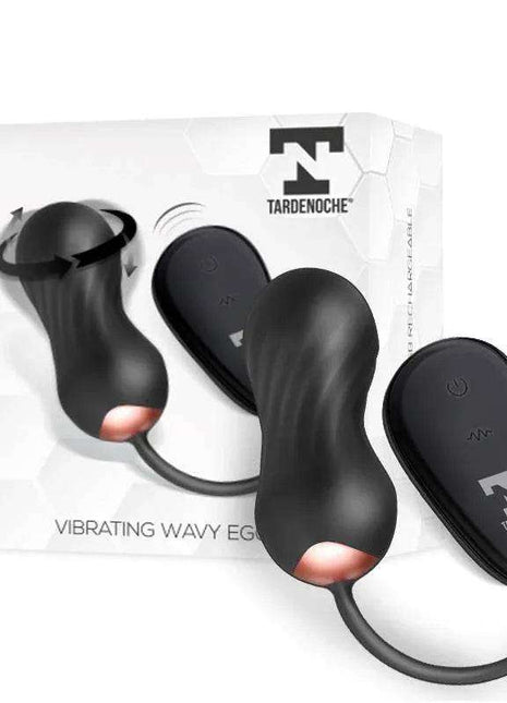 Zigzag Vibrating Egg in black silicone with a curved wavy shape, attached cord and matching remote control